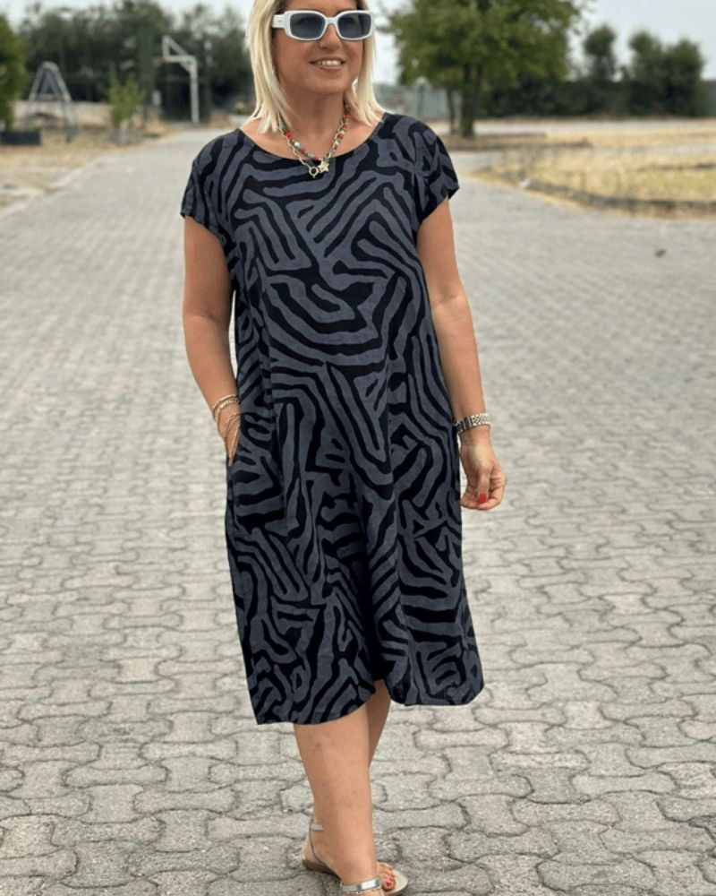 Nelia - Vestido de verão com decote redondo e estampa bonita
