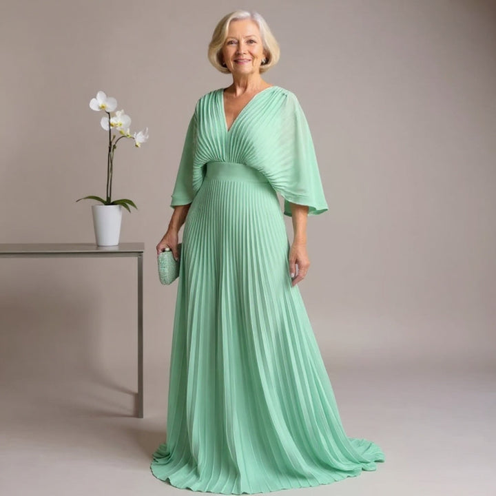 Greta | Vestido Maxi Plissado Flow – Onde a Leveza Encontra a Elegância