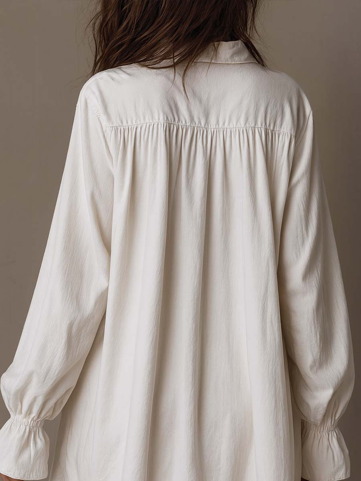 Vestido Mini de Manga Longa com Barra Irregular e Renda Branca
